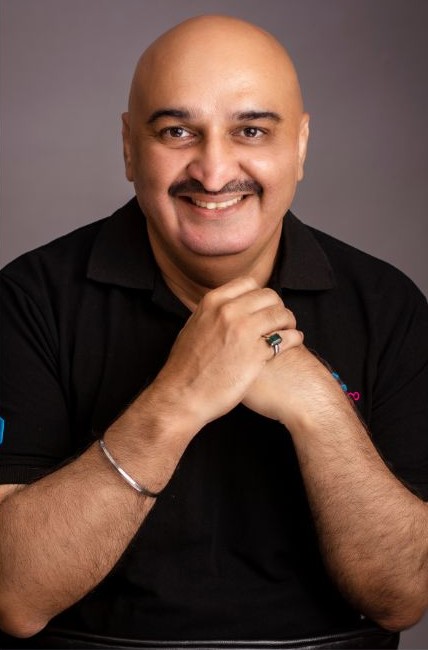 Harcharan Singh in a relaxed studio portrait